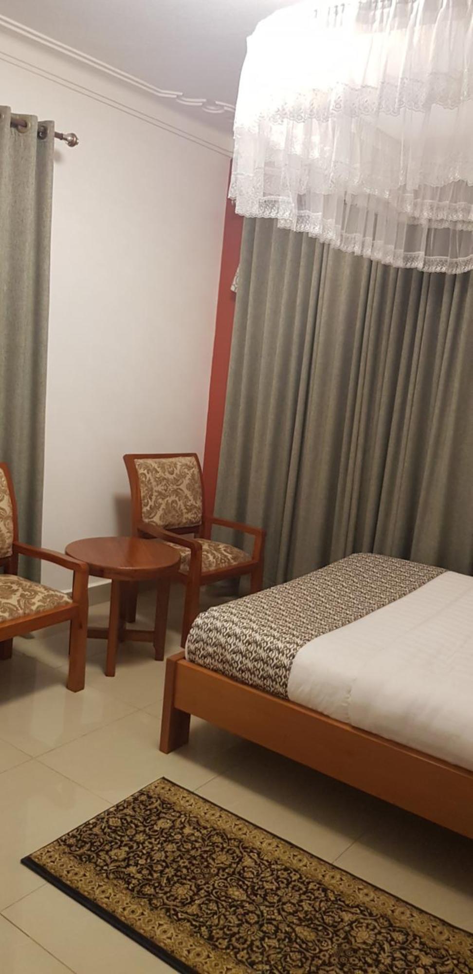 Fort Heights Homestay フォート・ポータル 部屋 写真